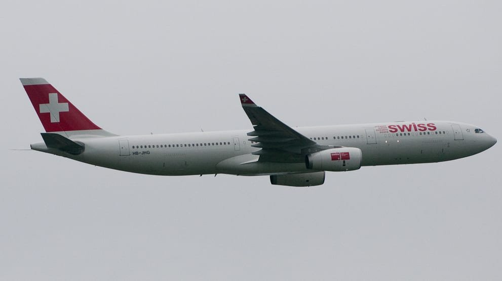 Illustrative image: a white Airbus A330 airliner seen from the side in flight.